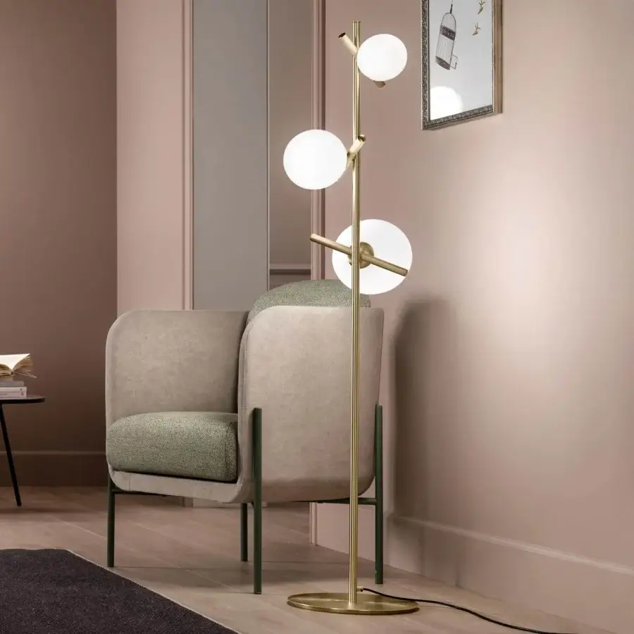 Elegant Masiero Posy floor lamp with a brass metal structure and triplex opal white Murano glass diffusers emitting balanced light