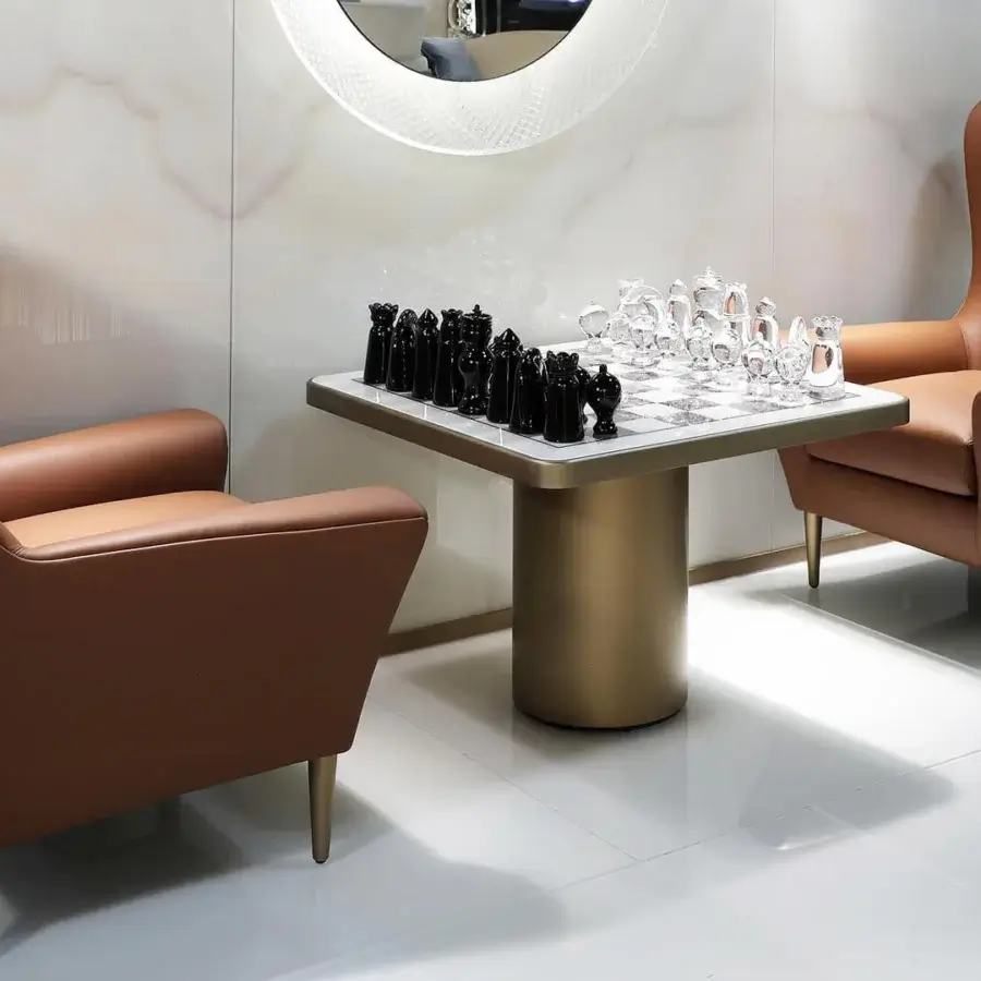 Distinctive Reflex Tau Steel Scacchi table with a marble glass chessboard top and satin brass cylinder base