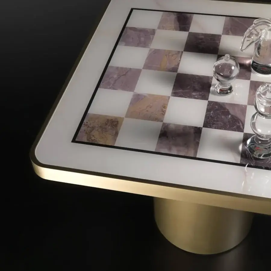 Luxury Reflex Tau Steel Scacchi table with a satin brass cylinder base and marble glass chessboard top built with gold trim