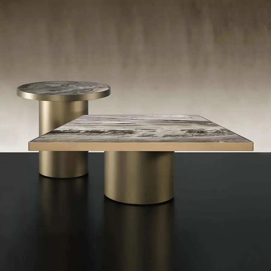 Superior Reflex Tau Steel coffee table with rounded corners and marble patterned top in blended grey and beige tones with golden finish