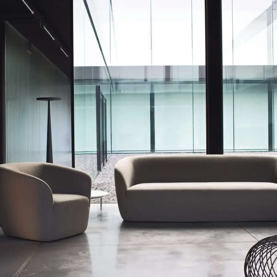Distinguished LaCividina Dep sofa with light gray textile upholstery and matte finish presenting soft, timeless lines crafted with wood and polyester fibre