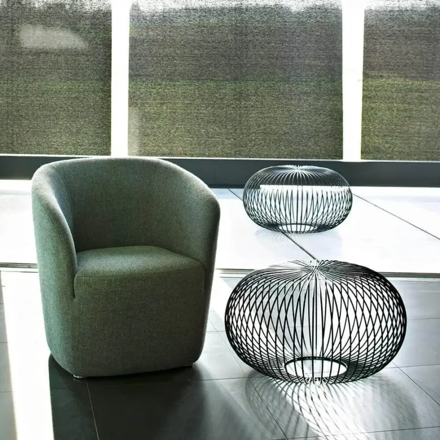 Distinguished LaCividina Dep lounge chair with woven textile upholstery in a muted green hue and stress-resistant frame