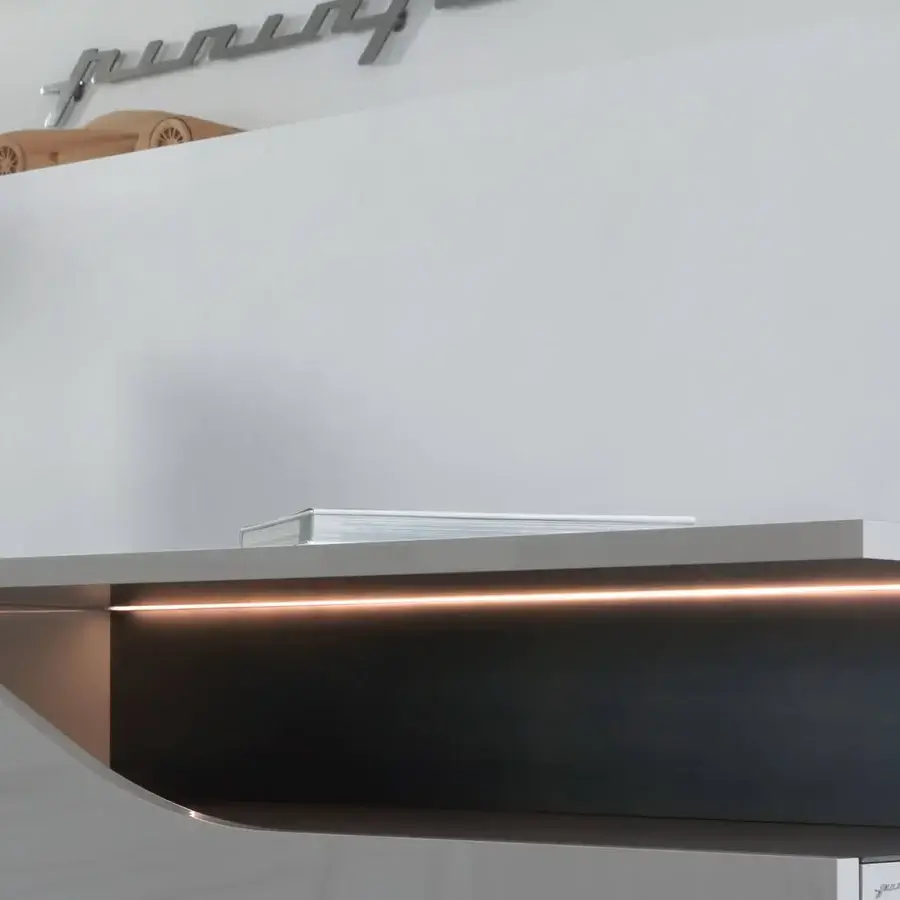 Superior Reflex Segno sideboard in light gray lacquered wood with warm orange underlighting and a dark gray open compartment