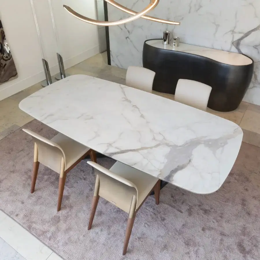 Sophisticated Reflex Segno table with a white Marmoreflex top and light brown composite material base