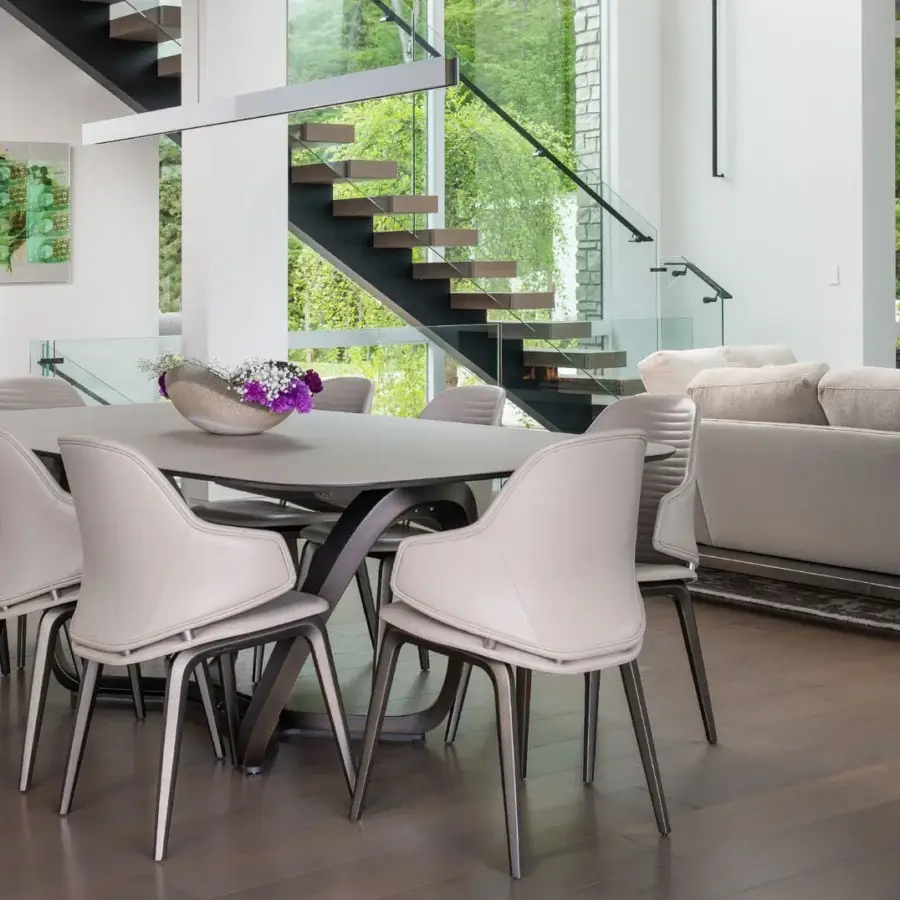 Exceptional Reflex Segno table with matte gray Marmoreflex top and curved dark brass metal supports crafted in Italy