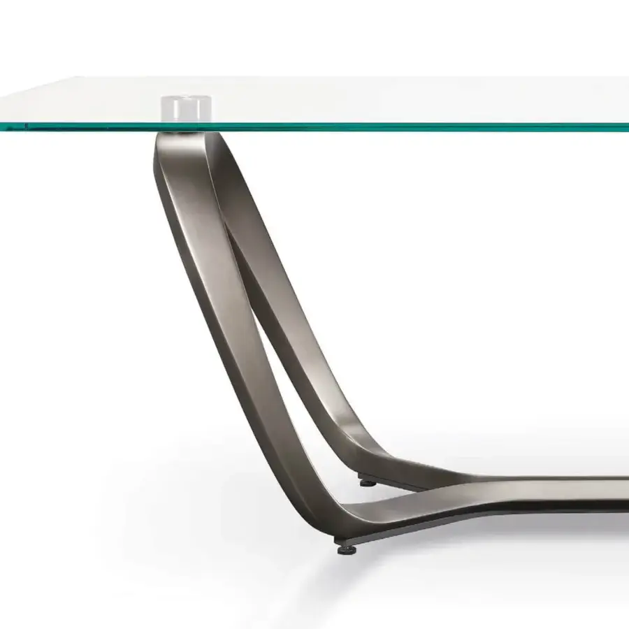 Distinctive Reflex Segno table with transparent tempered glass top and bronze composite material base crafted with elegantly curved supports