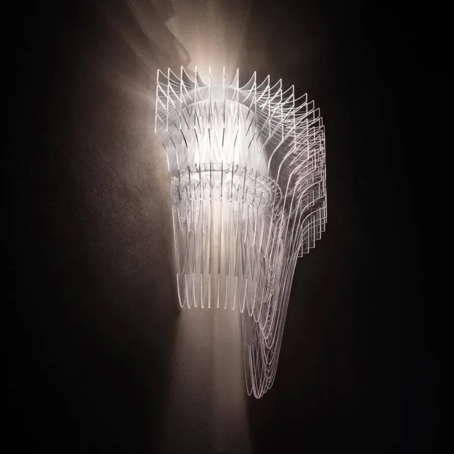 Sophisticated Slamp Aria wall lamp with 25 unique arms crafted in transparent Lentiflex and Cristalflex radiating a warm glow