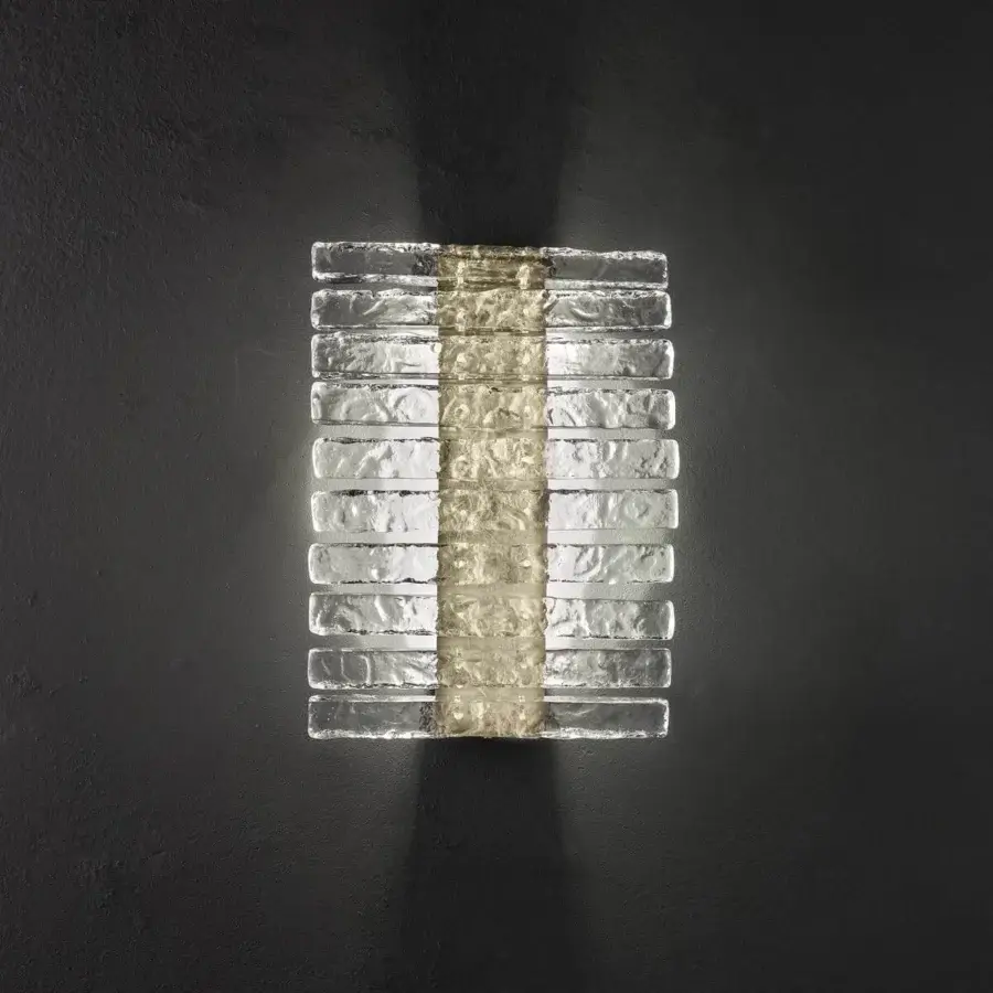Exclusive Masiero Vegas wall lamp with metal structure and clear rock-effect glass strips accented by amber-toned glass