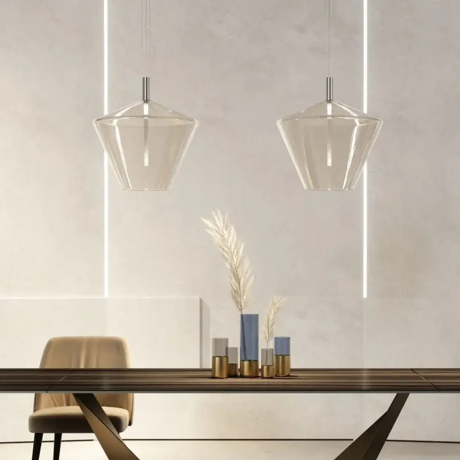 Distinguished Reflex 24 Gradi suspension lamp crafted in transparent blown glass with polished steel support and inner LED lighting system