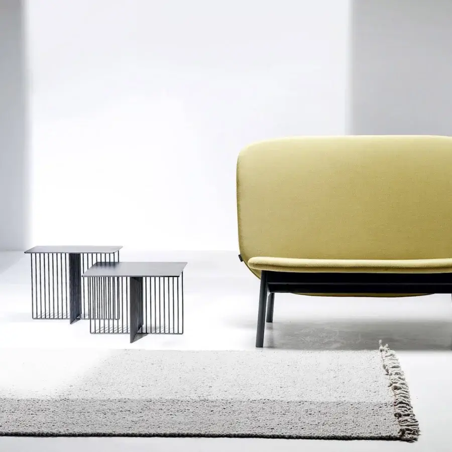 Distinguished LaCividina Accursio side table with a cross-shaped tubular steel base and square tabletop in matte dark gray finish