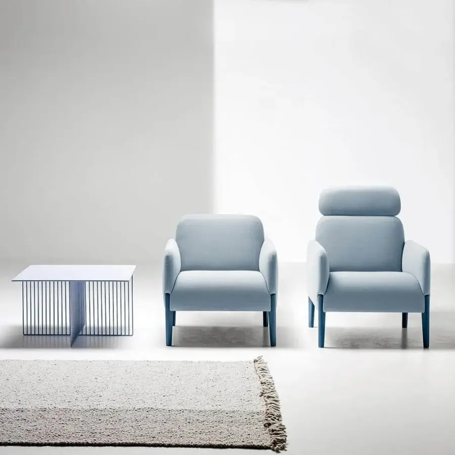 Elegant LaCividina Accursio side table with a crisp white top and dark handcrafted cross-shaped tubular steel base