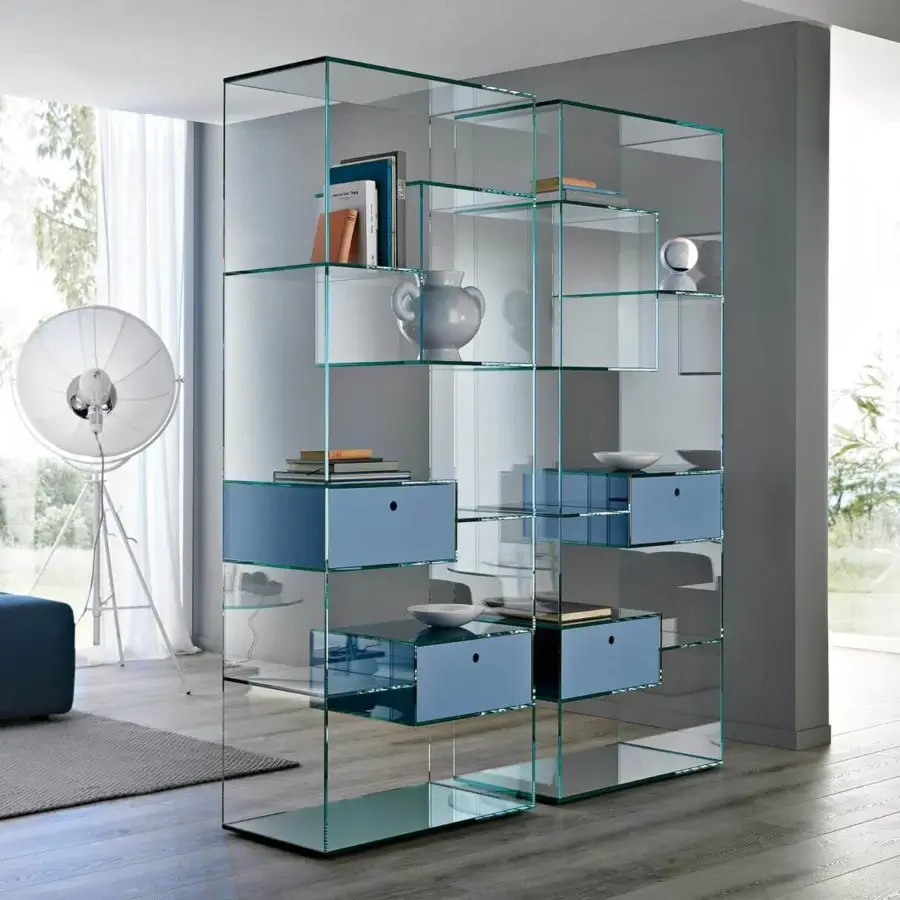 Exclusive Tonelli Design Liber bookcase with clear glass structure and light blue drawers offering a minimalist aesthetic