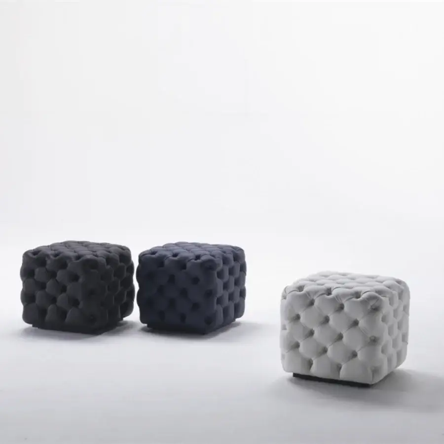 Distinguished Porada Alcide ottoman with light neutral tufted fabric upholstery and button secured geometric form