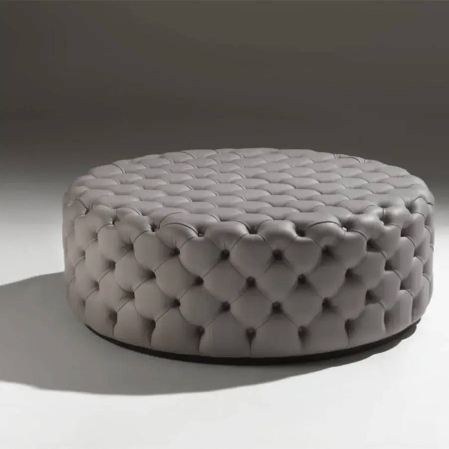 Superior Porada Alcide ottoman with cool gray leather upholstery and button-tufted design for a classic form
