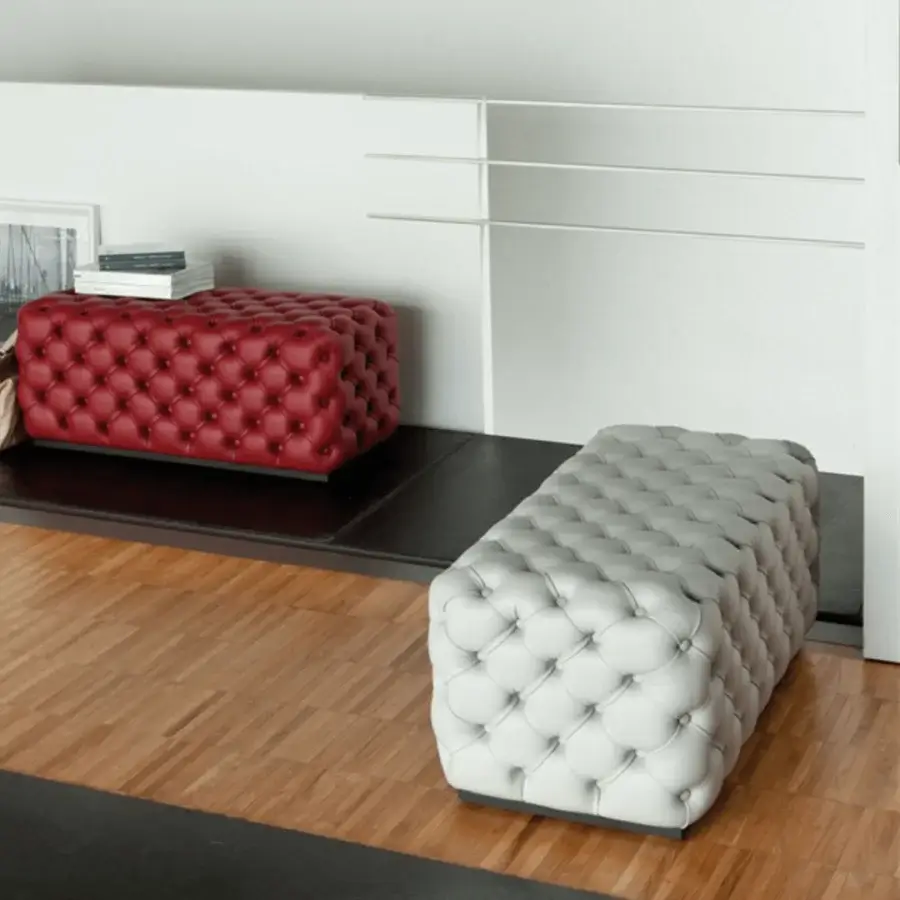 Distinguished Porada Alcide ottoman with smooth gray fabric upholstery and sophisticated tufted detailing