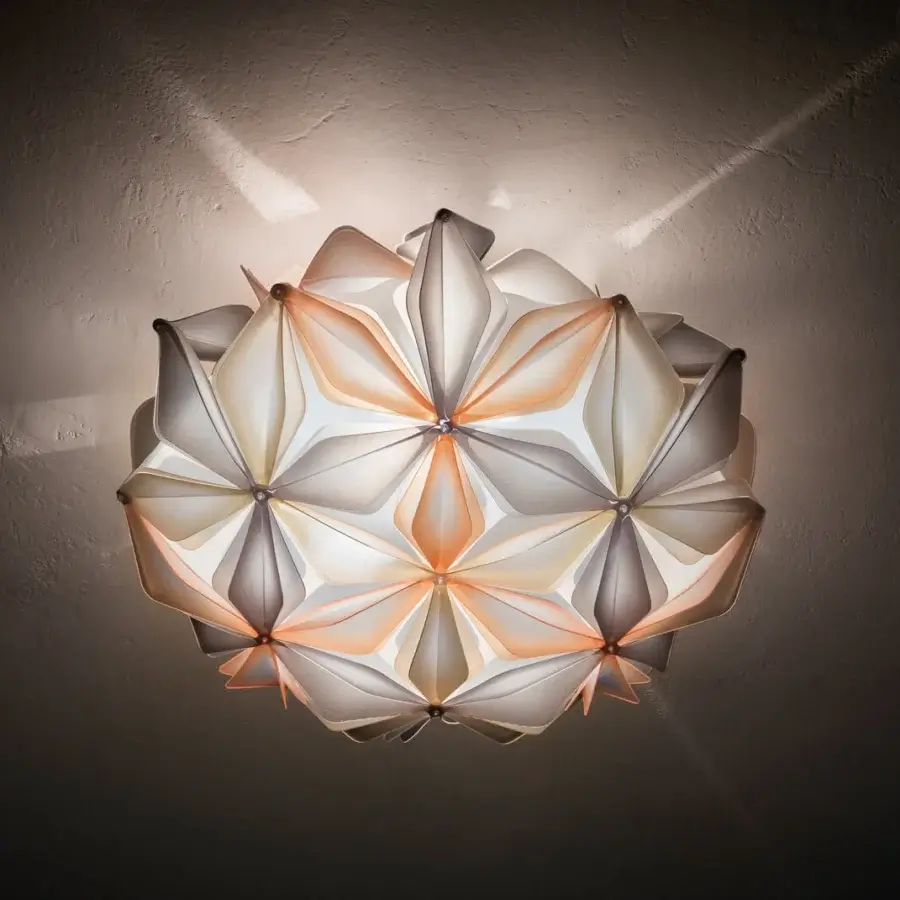 Distinguished Slamp La Vie ceiling/wall lamp with geometric petals crafted from Lentiflex and Opalflex in light orange and gray gradients