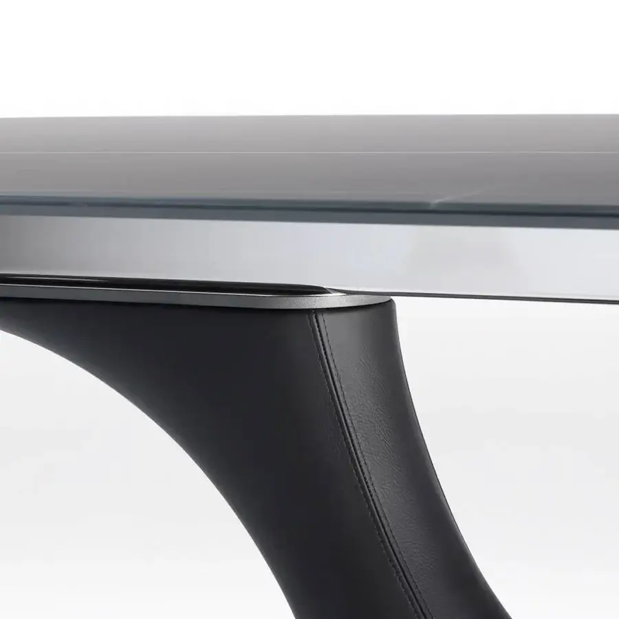 Innovative Reflex Archimede table with square-round Marble glass top and single Naturale leather covered leg in titanium satin metal