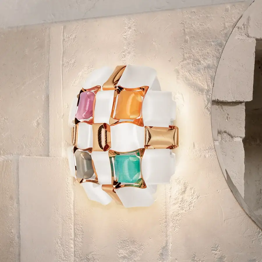 Distinguished Slamp Mida wall lamp crafted in white Opalflex® and printed Lentiflex® with geometrically scattered gems and shiny squares