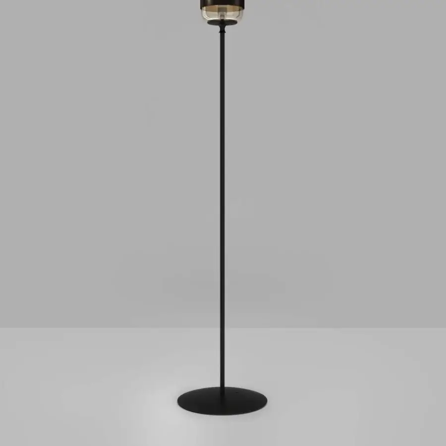 Distinguished Vistosi Futura floor lamp with a cylindrical shade crafted in transparent and diffused white hand-blown glass with a black band and pole