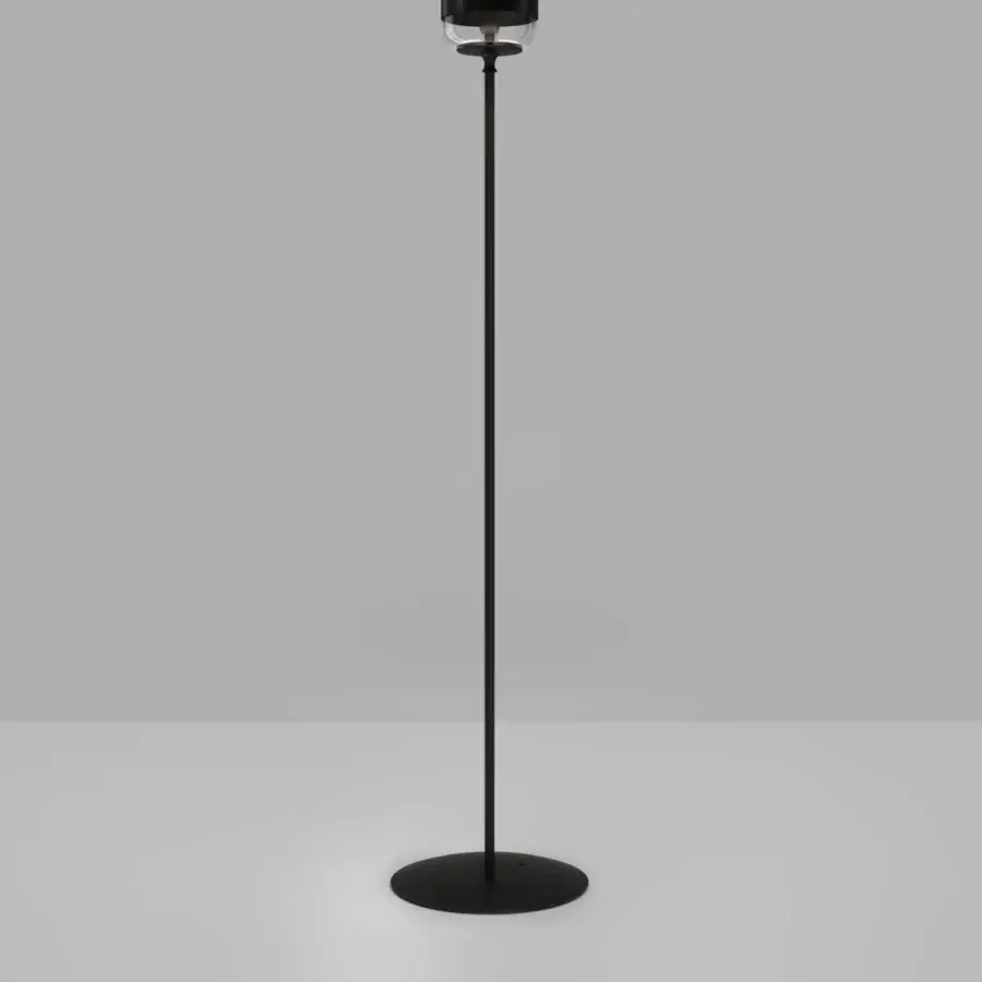 Superior Vistosi Futura floor lamp with a slender silhouette and transparent glass globe in matte black metal