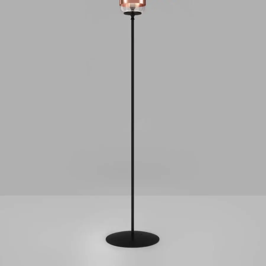 Exceptional Vistosi Futura floor lamp with a minimalist silhouette and transparent hand-blown glass shade in matte black metal