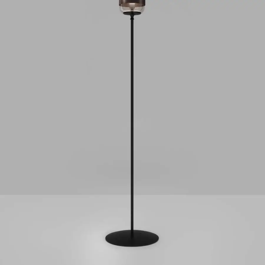 Distinguished Vistosi Futura floor lamp with a clear blown glass shade and slender matte black metal stem