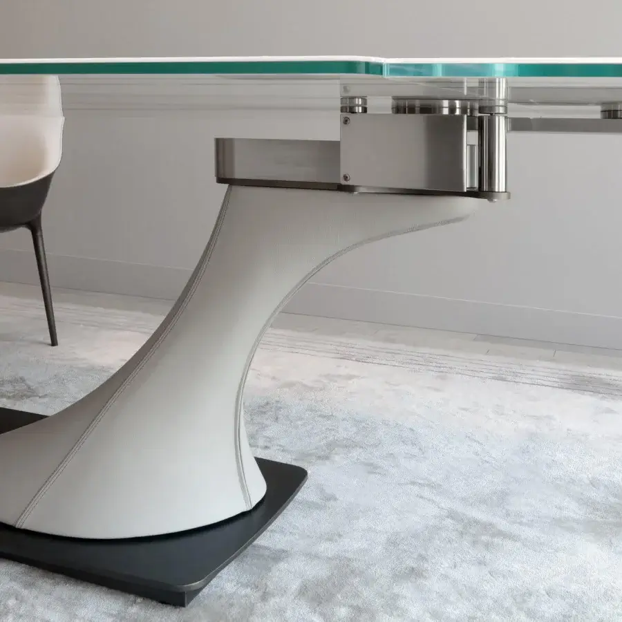 Elegant Reflex Archimede table with square-round Marble glass and light gray Naturale leather pedestals in satin-finished dark titanium metal