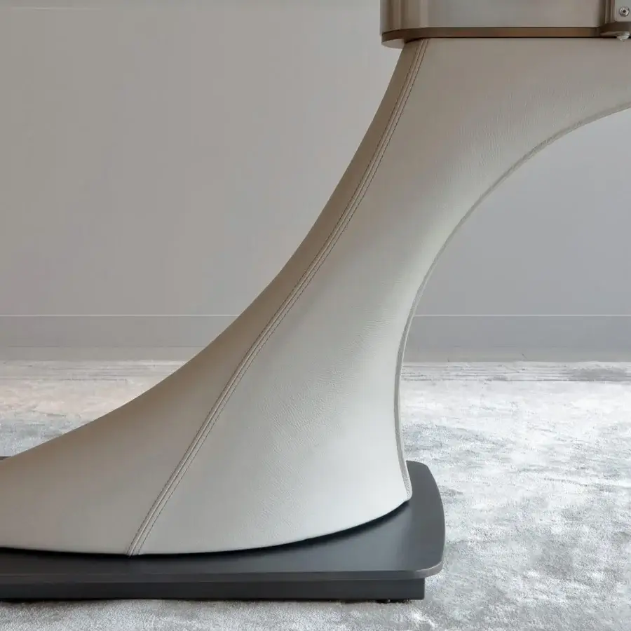 Exceptional Reflex Archimede table with Naturale leather legs and dark gray matte satin metal plinth supporting Marble glass or Wood glass