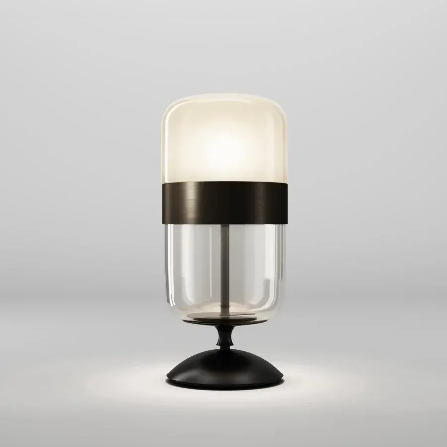 Exceptional Vistosi Futura table lamp with hand-blown glass transitioning from frosted to clear sections and a matte finished base