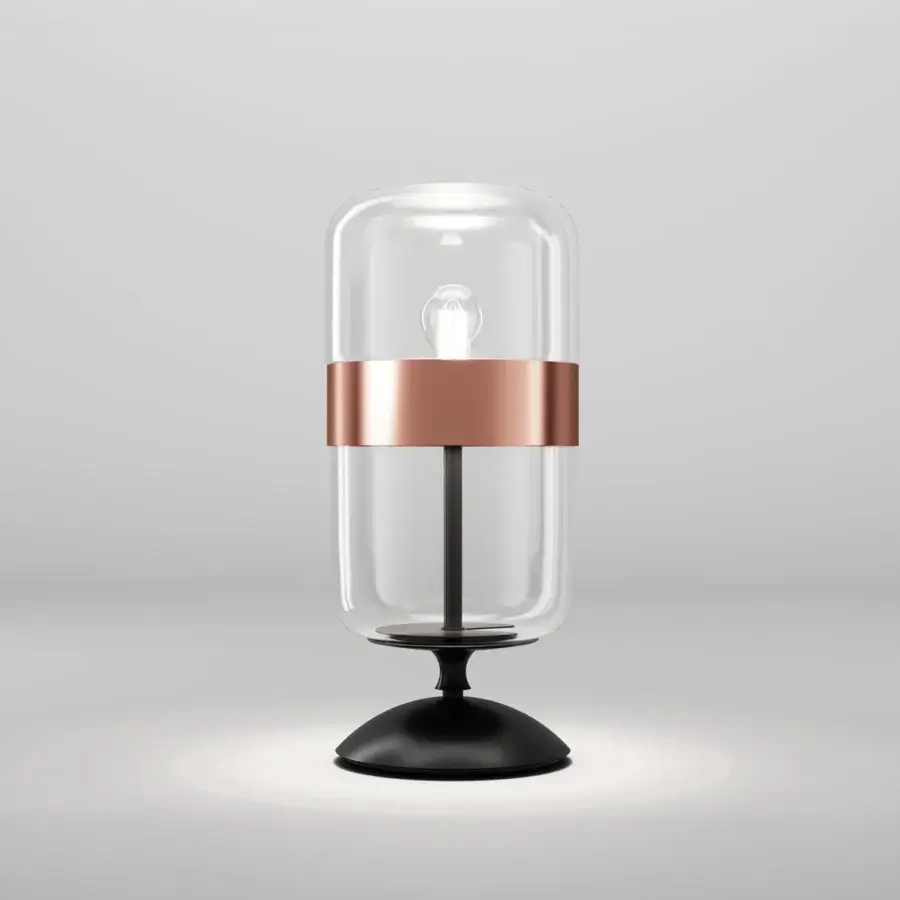 Distinguished Vistosi Futura table lamp with transparent and diffused blown glass encircled by a copper-colored metal ring and matte black base