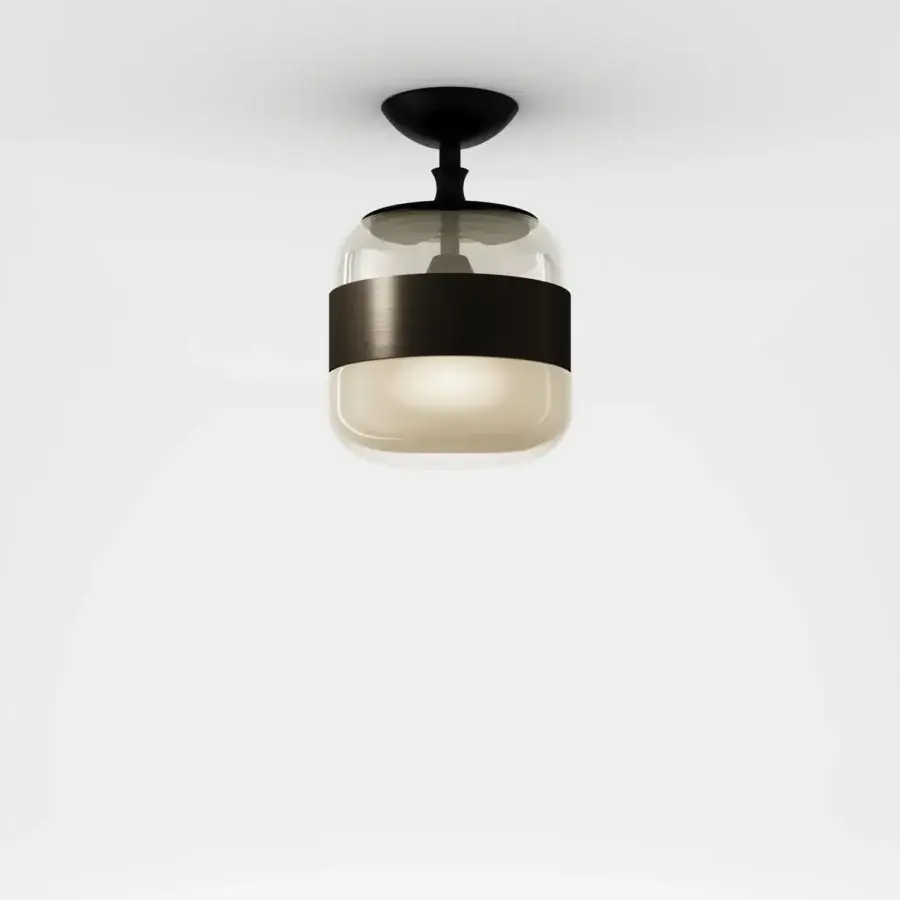 Distinguished Vistosi Futura ceiling lamp crafted in hand-blown glass with a transparent upper portion and diffused lower section with a matte dark metal ring