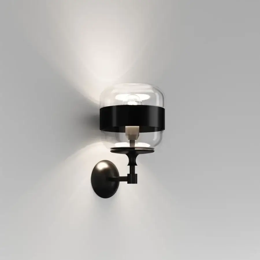Superior Vistosi Futura wall lamp crafted in clear hand-blown glass with a matte black metal ring and wall mount