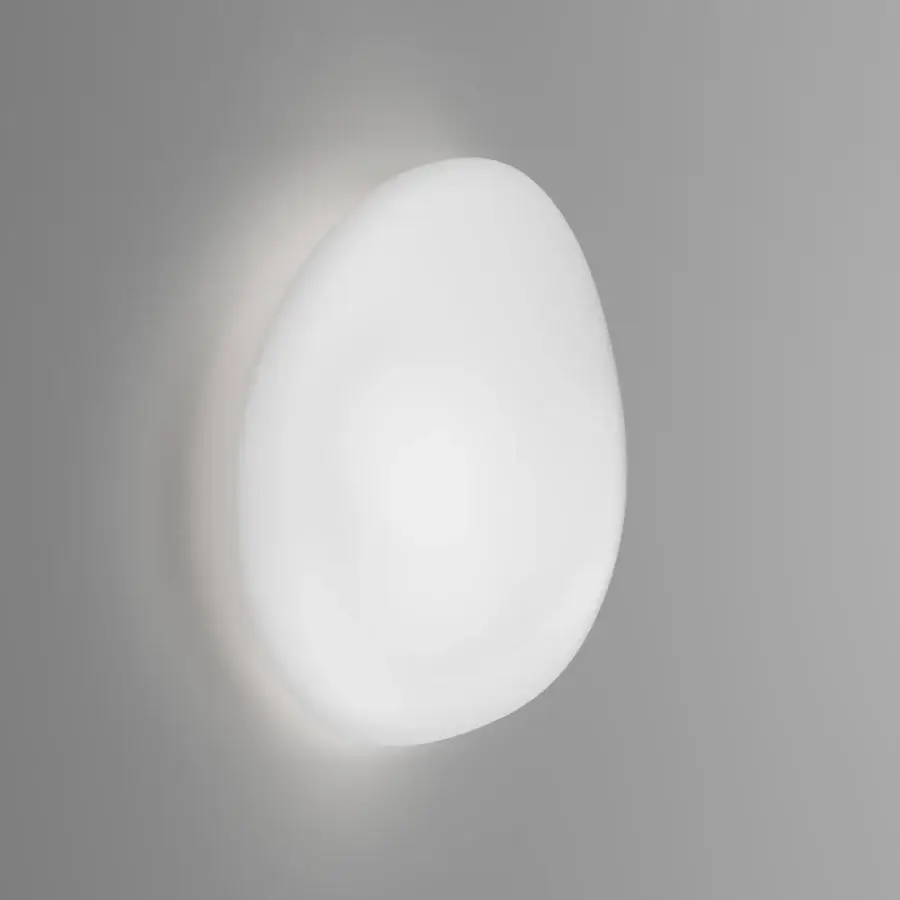 Elegant Vistosi Neochic wall lamp with soft light diffusion in refined matt white glass and glossy white metal parts
