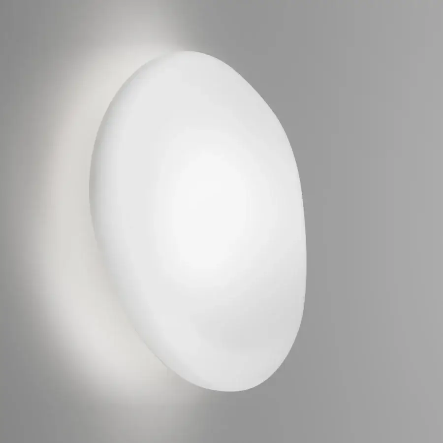 Elegant Vistosi Neochic wall lamp with organic rounded form crafted in refined matt white glass and glossy white metal