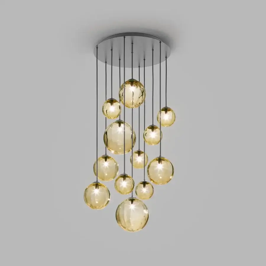 Elegant Vistosi Puppet suspension lamp with translucent amber hand-blown glass shades and sleek matte black metal parts