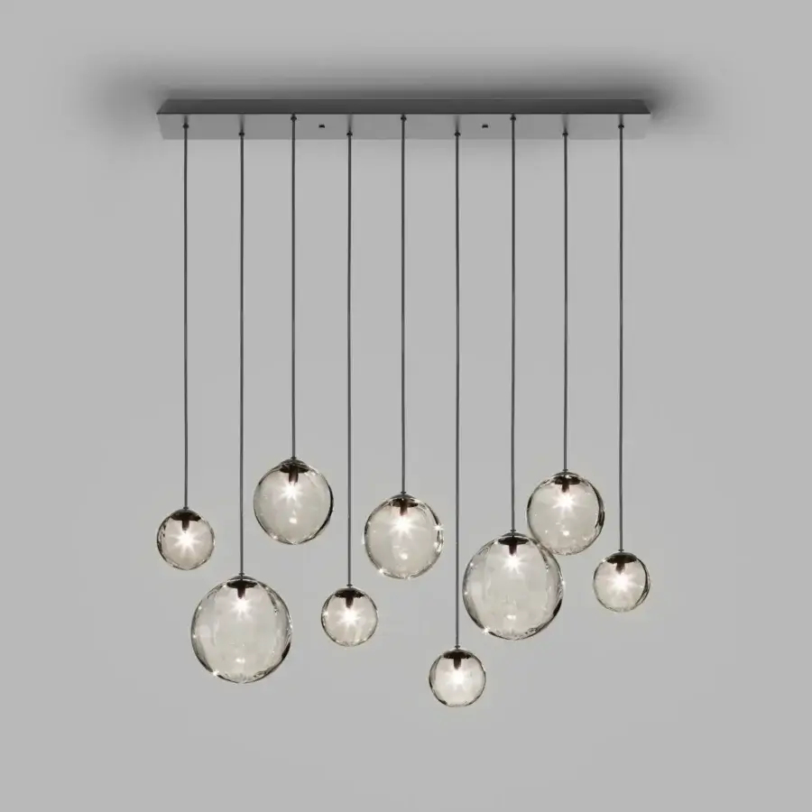 Exclusive Vistosi Puppet suspension lamp with ten irregularly lined translucent blown glass lampshades and glossy chrome base