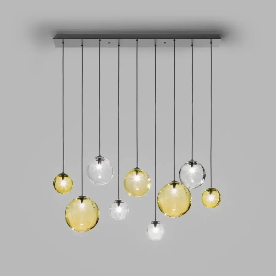 Distinguished Vistosi Puppet suspension lamp with hand-blown clear amber glass shades and matte black metal canopy