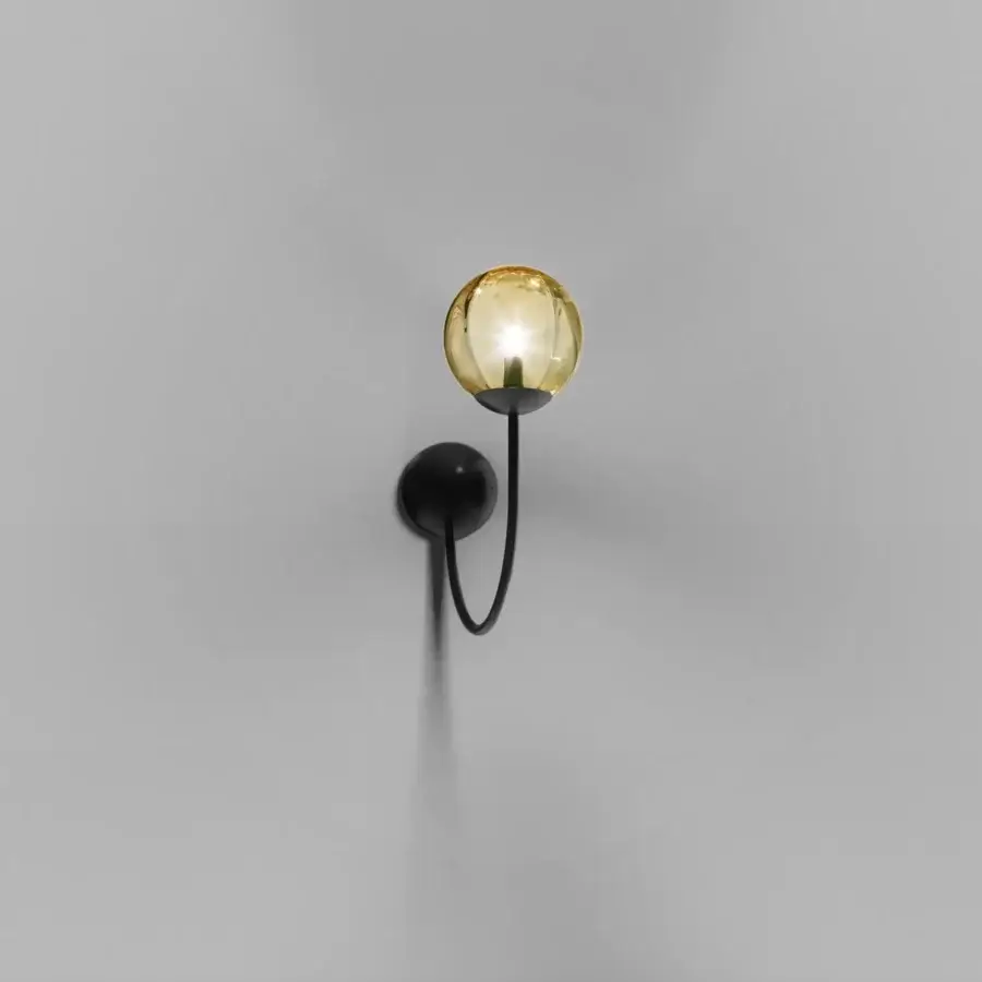 Elegant Vistosi Puppet wall lamp crafted in golden-toned blown glass with sleek matte black metal parts