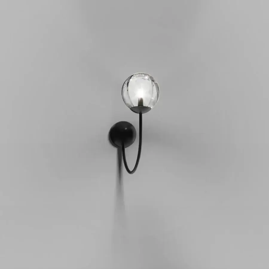 Exceptional Vistosi Puppet wall lamp crafted in blown glass with irregular dégradé finish and matte black metal arm