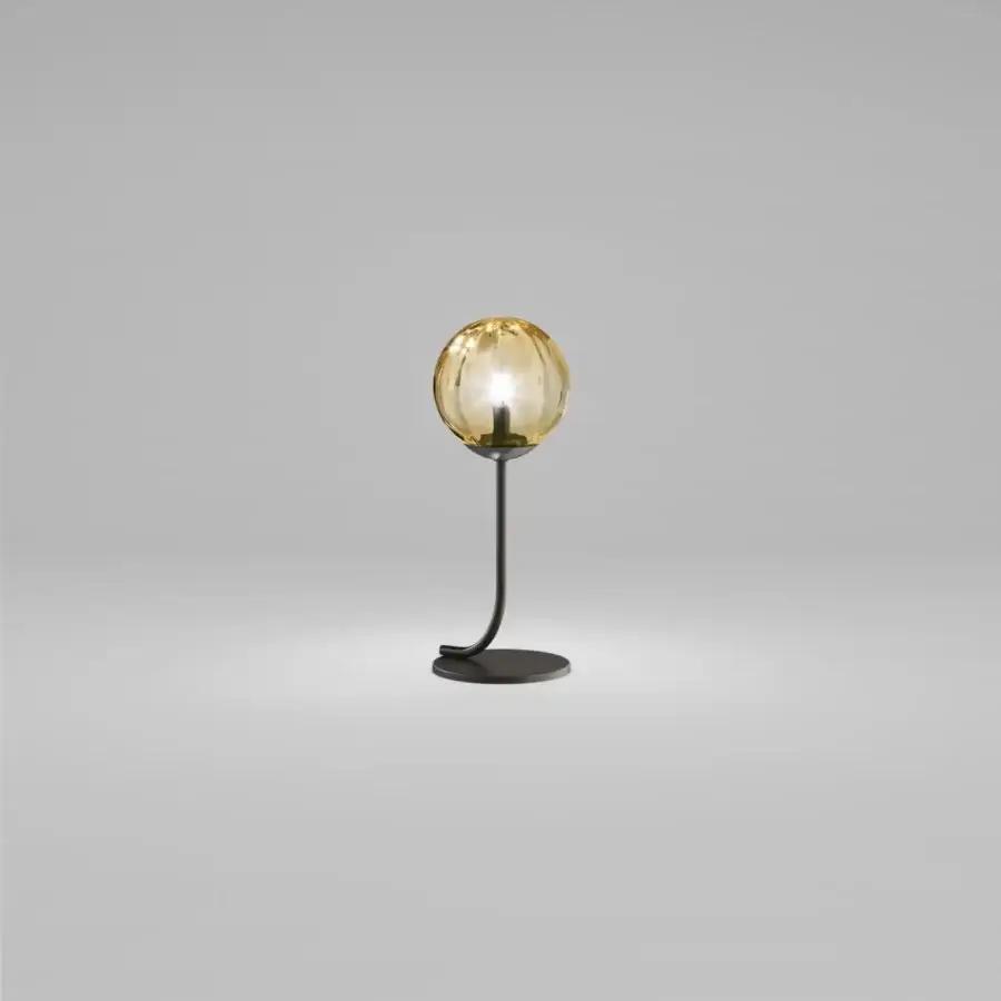 Refined Vistosi Puppet table lamp with amber blown glass lampshade and sleek matt black metal parts