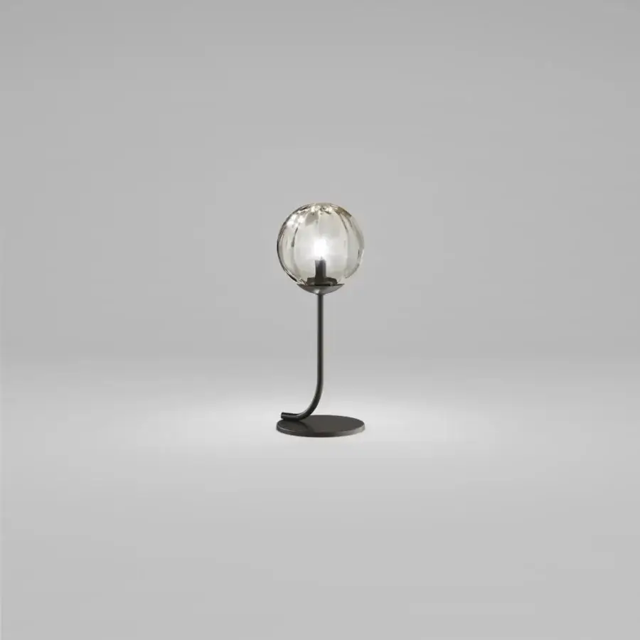 Exceptional Vistosi Puppet table lamp with clear blown glass lampshade and glossy chrome metal parts