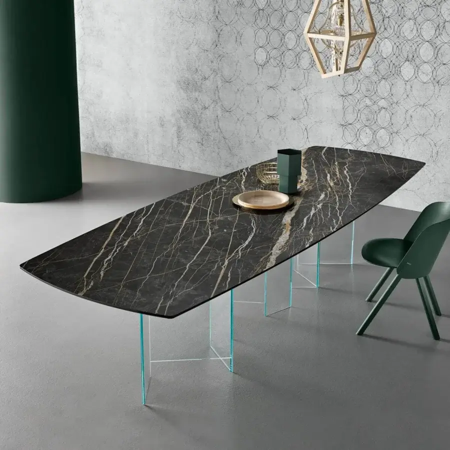 Architectural Tonelli Design Metropolis table with a shaped ceramic top and transparent staggered glass base in a dark faux marble finish