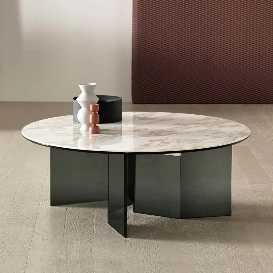 Distinguished Tonelli Design Metropolis coffee table with a round marble-patterned glass top and symmetrical extra-clear glass base