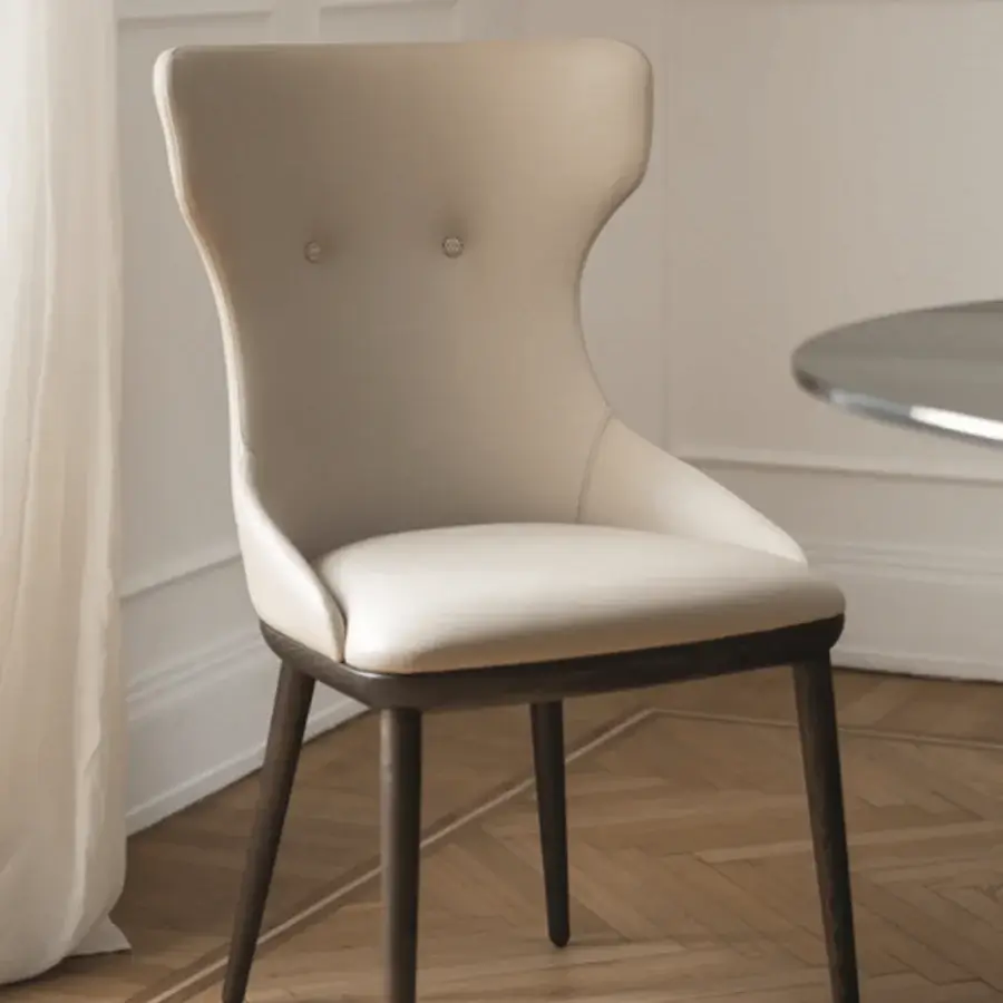 Sophisticated Porada Andy chair with Canaletta Walnut frame and light-colored fabric upholstery, built with button details