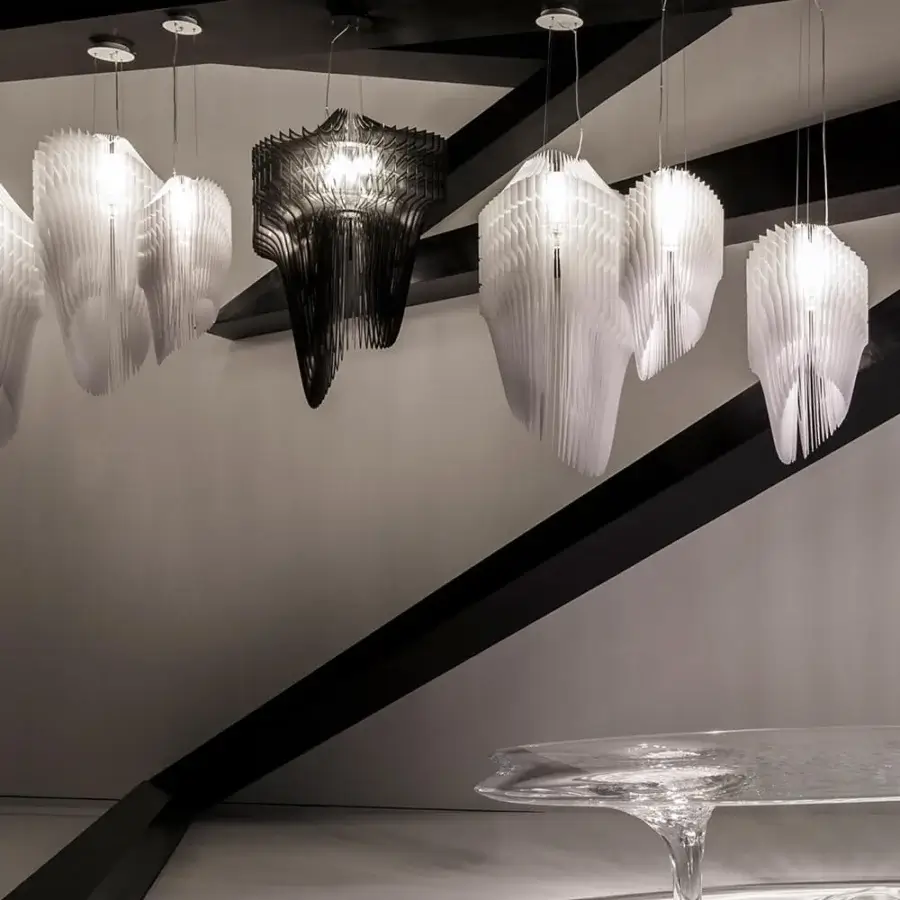 Innovative Slamp Avia suspension lamp transforms light with a dynamic, matte white Cristalflex® cascade crafted in Italy