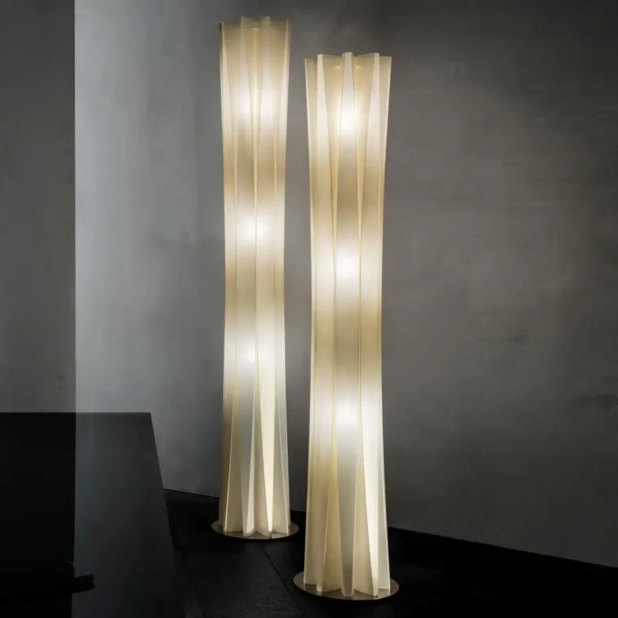 Distinguished Slamp Bach floor lamp with elegant curves and warm diffused light in white Opalflex® material