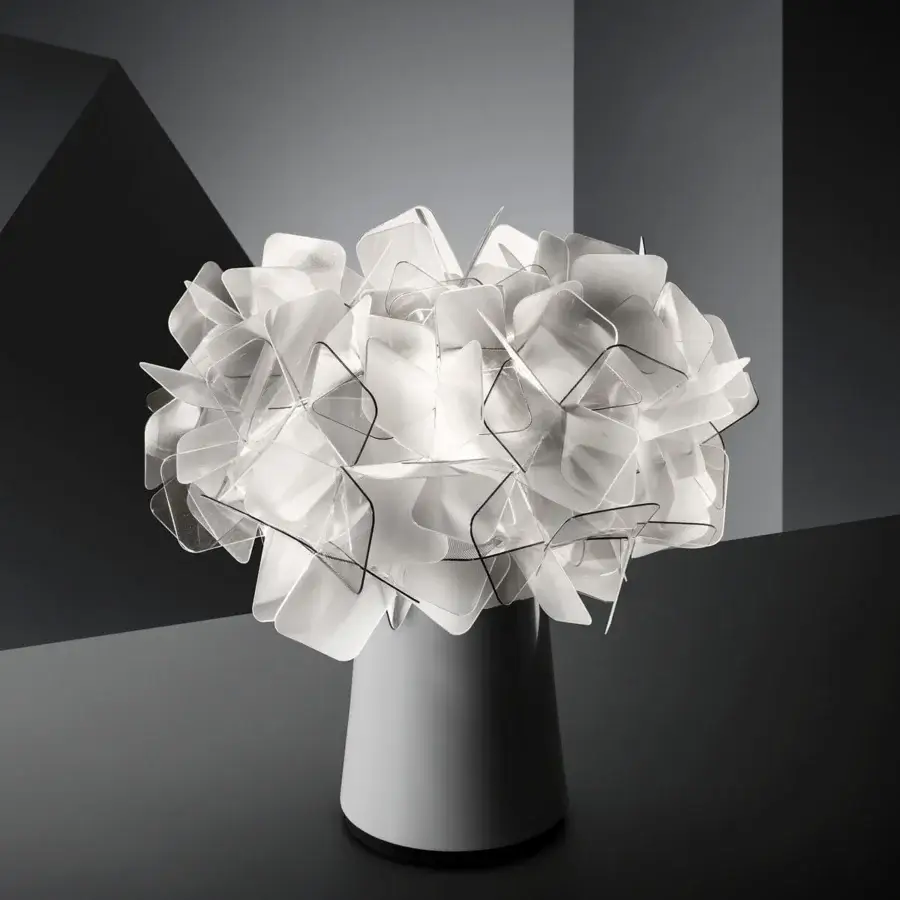 Exceptional Slamp Clizia Battery Table Lamp lighting with a voluminous shade formed from overlapping translucent white quadrilaterals
