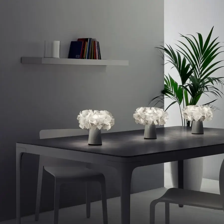 Distinguished Slamp Clizia Battery Table Lamp lighting with a flower-like silhouette in pure white matte synthetic material