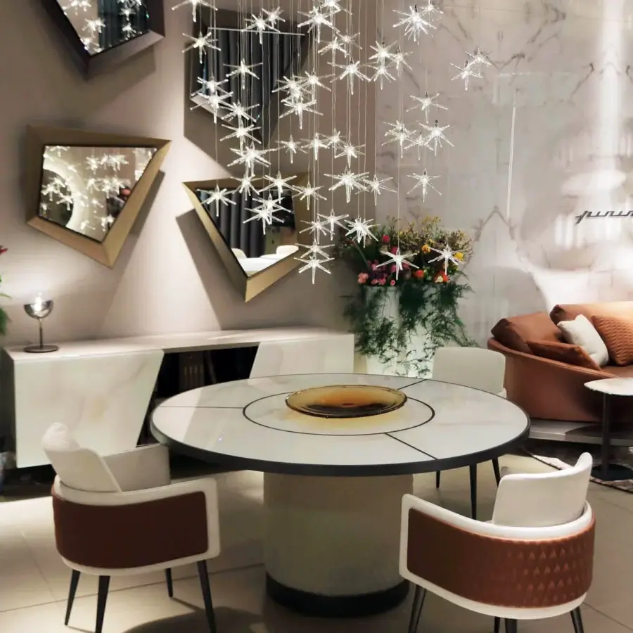 Lavish Reflex Signore degli Anelli table built with quilted Nabuk leather, lacquered wood, and Marmoreflex, showcasing a dark Lazy Susan insert