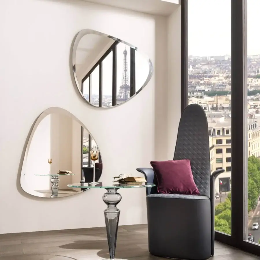 Innovative Reflex Seventy mirror crafted from extra-clear glass with silver-colored frame and regular beveled edge